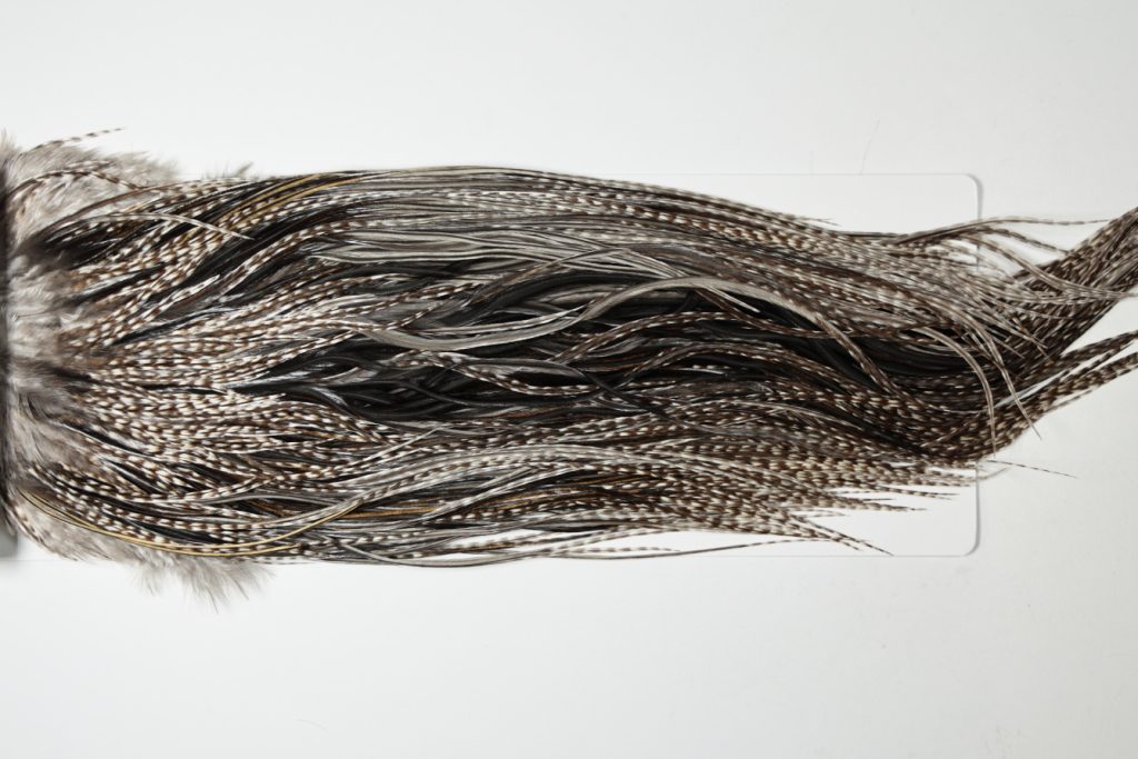 HBGS-6279 Hebert Dry Fly Hackle, Bronze Grade Saddle Variant Ties Sizes 14-16