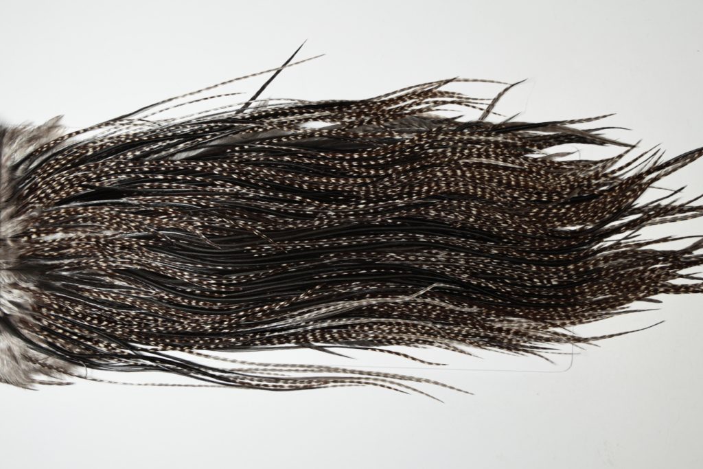 HBGS-6282 Hebert Dry Fly Hackle, Bronze Grade Saddle Variant Ties Sizes 14-16