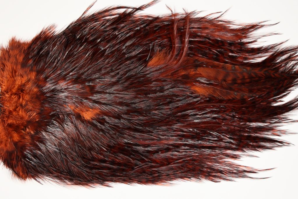 7615 Coq De Leon Dry Fly Hackle, Bronze Grade Saddle Fiery Brown