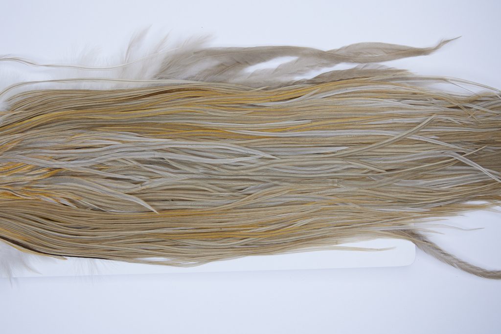525 - Hebert Dry Fly Hackle, Light Tan Dun Gold Grade Rooster Saddle, Ties Sizes 12-14