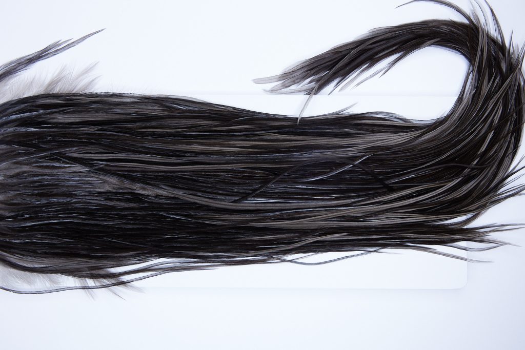 535 - Hebert Dry Fly Hackle, Black Gold Grade Rooster Saddle, Ties Sizes 12-14