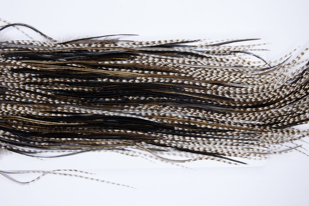 550 - Hebert Dry Fly Hackle, Dun Grizzly Bronze Grade Rooster Saddle, Ties Sizes 14-16