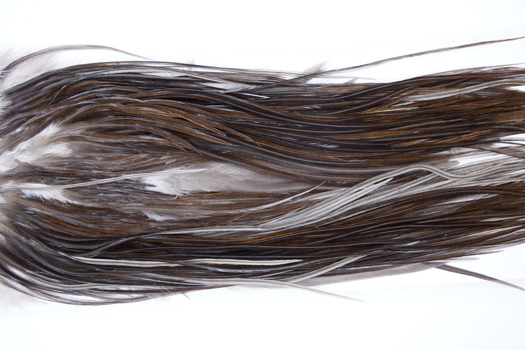 600 - Hebert Dry Fly Hackle, Dark Grey Dun Pro Grade Rooster Saddle, Ties Sizes 12-14