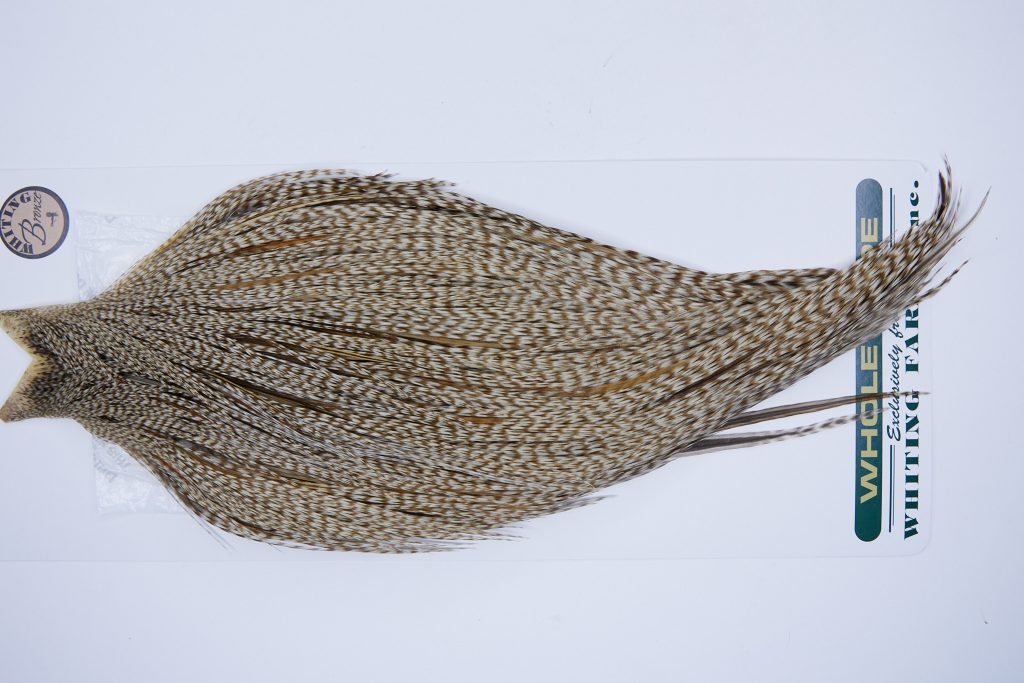 703 - Hebert Dry Fly Hackle, Dun Grizzly Bronze Grade Rooster Cape, Ties Sizes 14-22