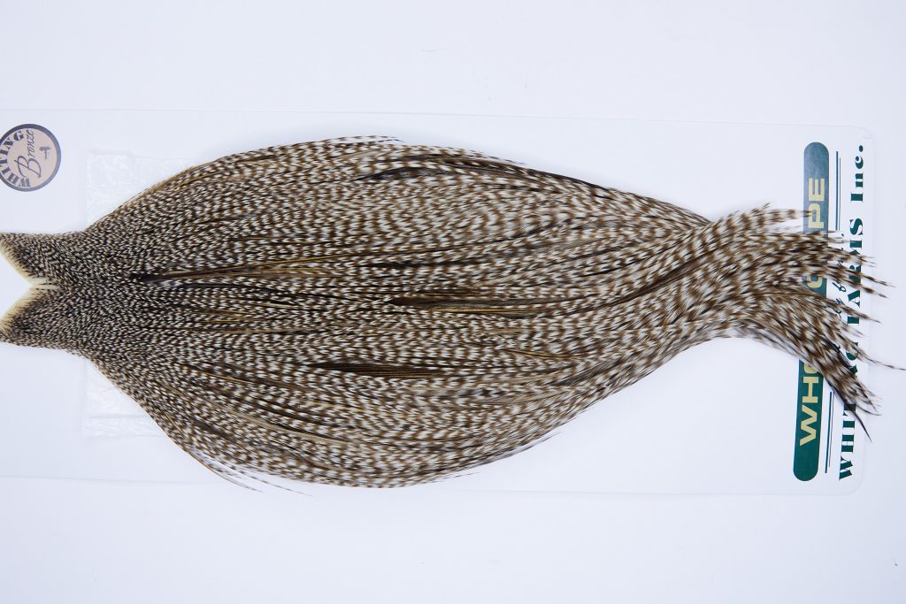 704 - Hebert Dry Fly Hackle, Dun Grizzly Bronze Grade Rooster Cape, Ties Sizes 12-20