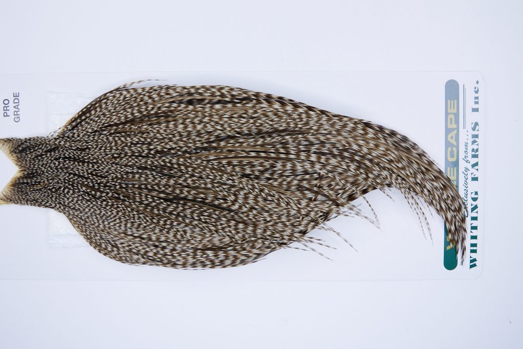 710 - Hebert Dry Fly Hackle, Dun Grizzly Pro Grade Rooster Cape, Ties Sizes 14-20