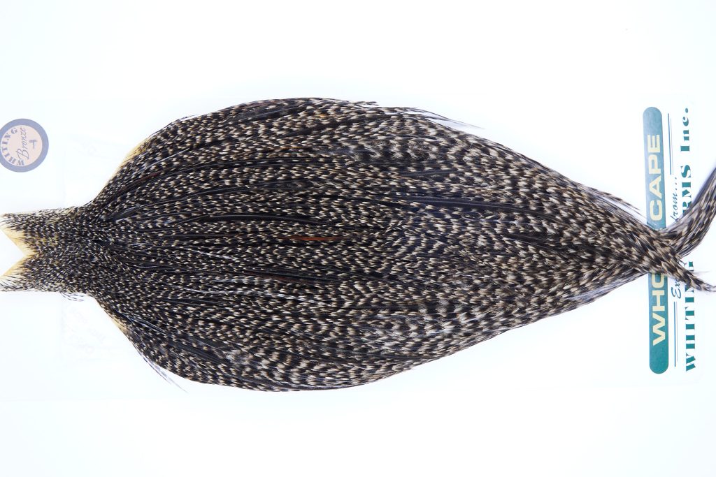 739 - Hebert Dry Fly Hackle, Grizzly Variant Bronze Grade Rooster Cape, Ties Sizes 12-18