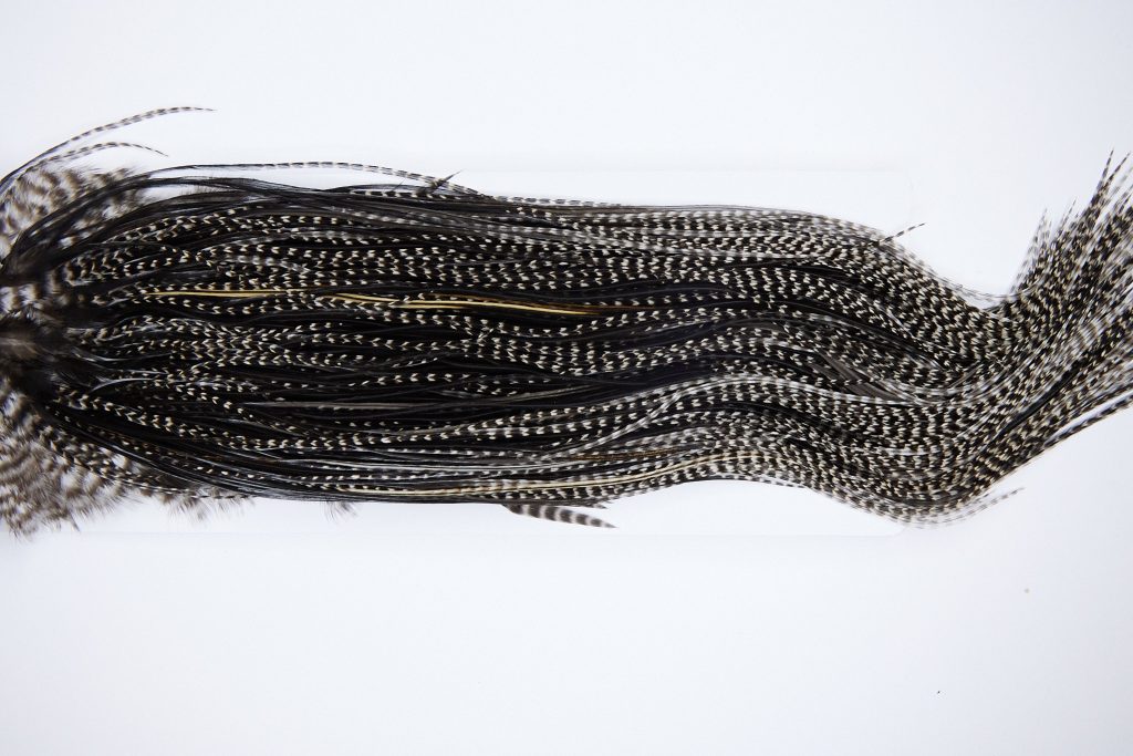 1306 Hebert Dry Fly Hackle, Gold Grade Rooster Saddle Grizzly Variant Ties Sizes 14-16