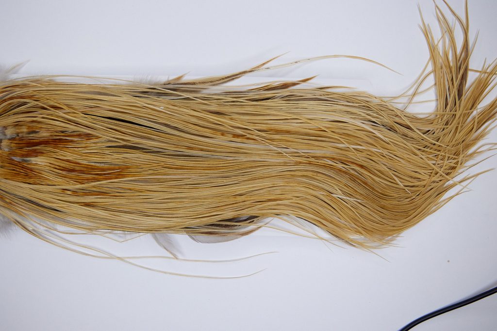 1319 Hebert Dry Fly Hackle, Silver Grade 14-18 Light Ginger Ties Sizes 14-18