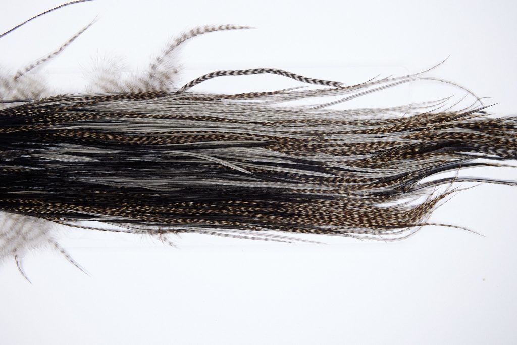 1344 Hebert Dry Fly Hackle, Silver Grade Rooster Saddle Variant Ties Sizes 12-14