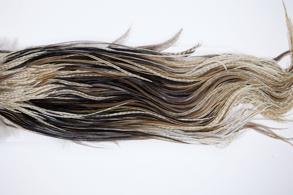 1346 Hebert Dry Fly Hackle, Silver Grade Rooster Saddle Variant Ties Size None