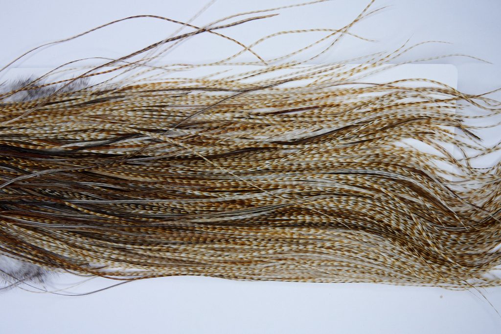 1621 Whiting Dry Fly Hackle, Bronze Grade Midge Saddle Medium Barred Ginger Ties Sizes 18-20