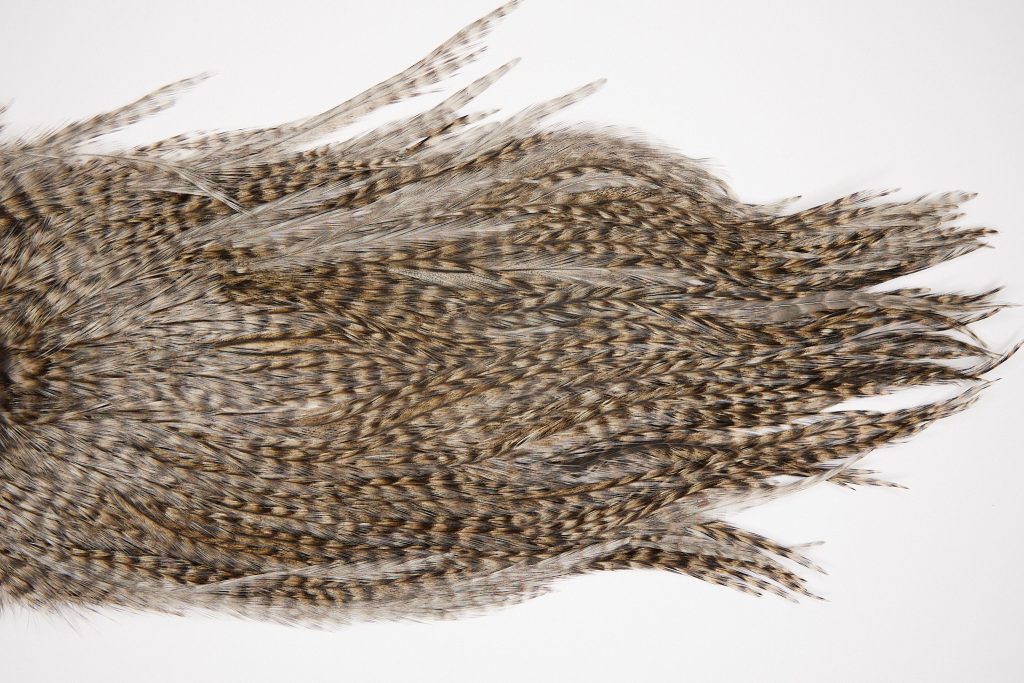 2581 Coq De Leon Dry Fly Hackle,  Silver Grade Rooster Saddle Grizzly Pardo