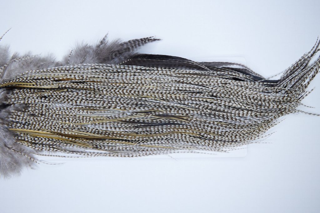 1954 Heritage Dry Fly Hackle, Grizzly Variant #2 Grade Rooster Saddle, Ties Sizes 14-16