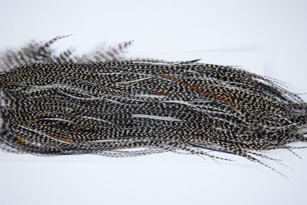 3986 Hebert Dry Fly Hackle, Bronze Grade Rooster Saddle Grizzly Variant Ties Size 14-16