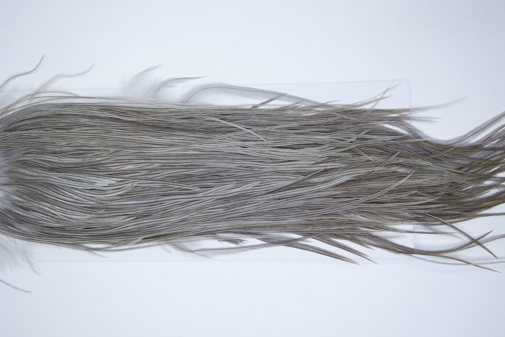 3995 Hebert Dry Fly Hackle, Bronze Grade Rooster Saddle Medium Grey Dun Ties Size 12-14