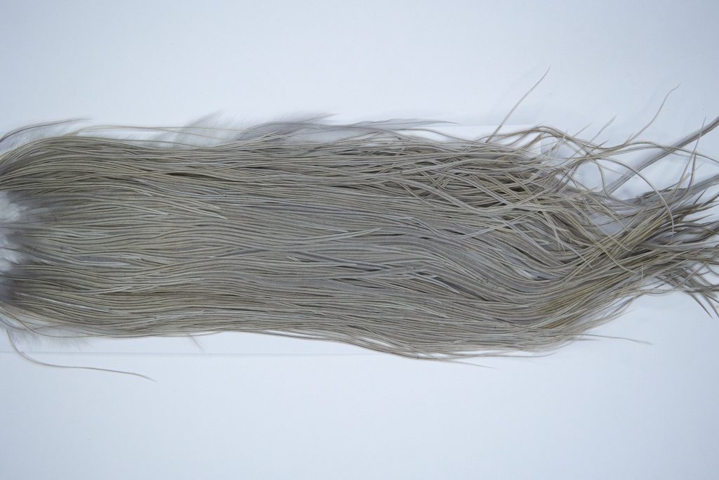 4017 Hebert Dry Fly Hackle, Silver Grade Rooster Saddle Light Grey Dun Ties Size 12-14