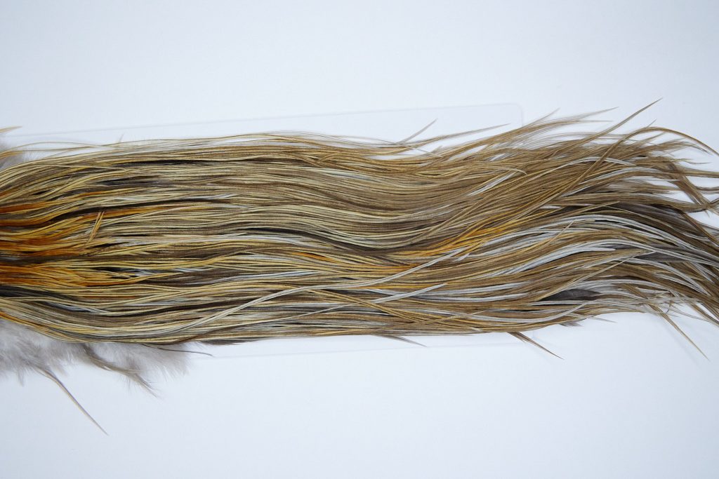 4019 Hebert Dry Fly Hackle, Gold Grade Rooster Saddle Light Ginger Dun Ties Size 10-12