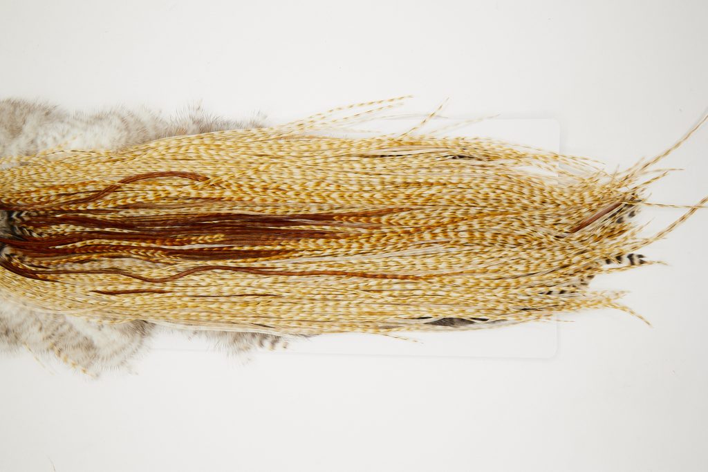 10857 Hebert Dry Fly Hackle Bronze Grade Rooster Saddle Medium Barred Ginger Ties Size 14-16