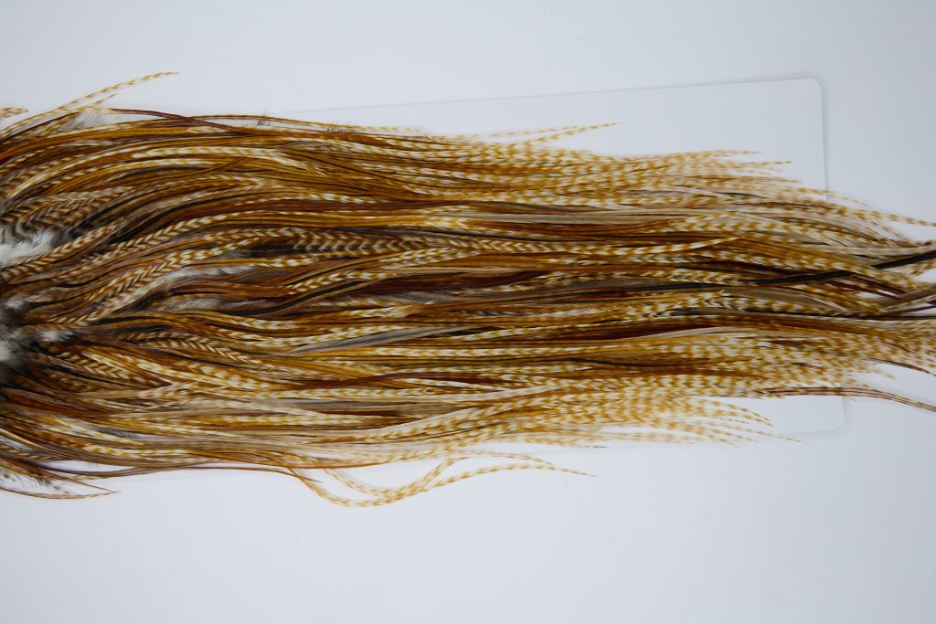 12019 Hebert Dry Fly Hackle Silver Grade Rooster Saddle Medium Barred Ginger Ties Size 14-16