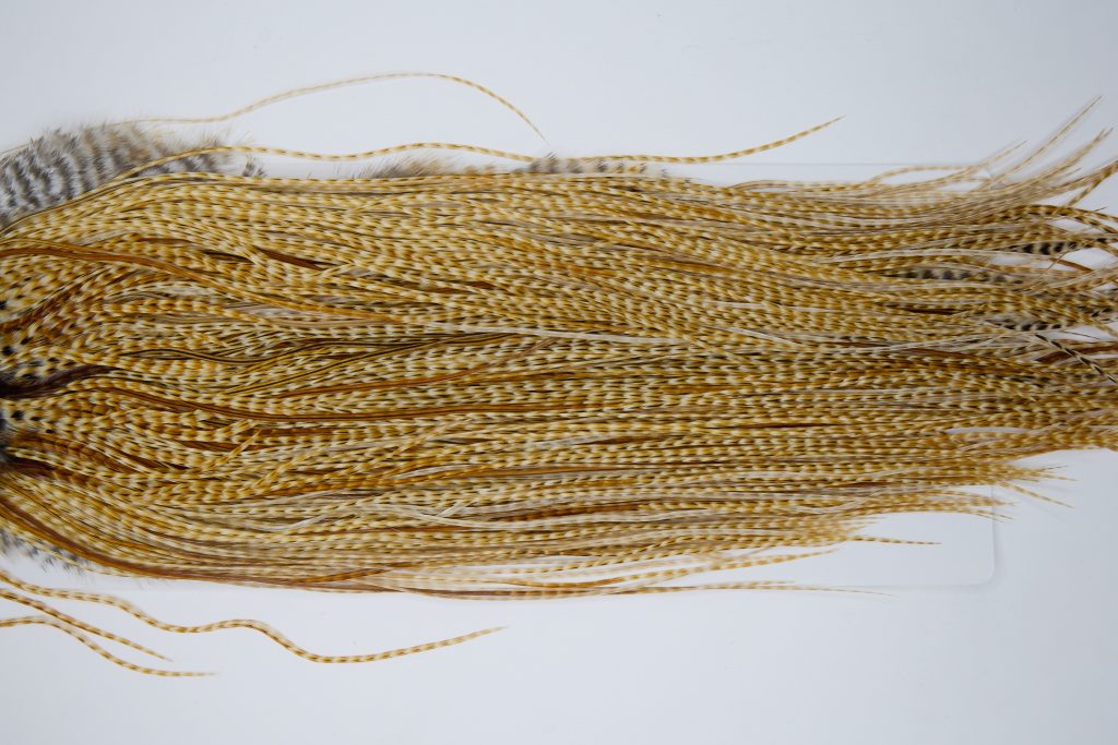 12020 Hebert Dry Fly Hackle Silver Grade Rooster Saddle Medium Barred Ginger Ties Size 14-18