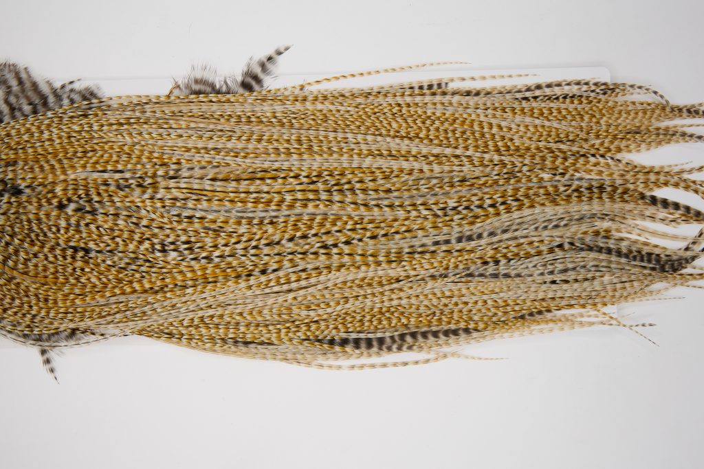 12050 Hebert Dry Fly Hackle Bronze Grade Rooster Saddle Medium Barred Ginger Ties Size 10-16